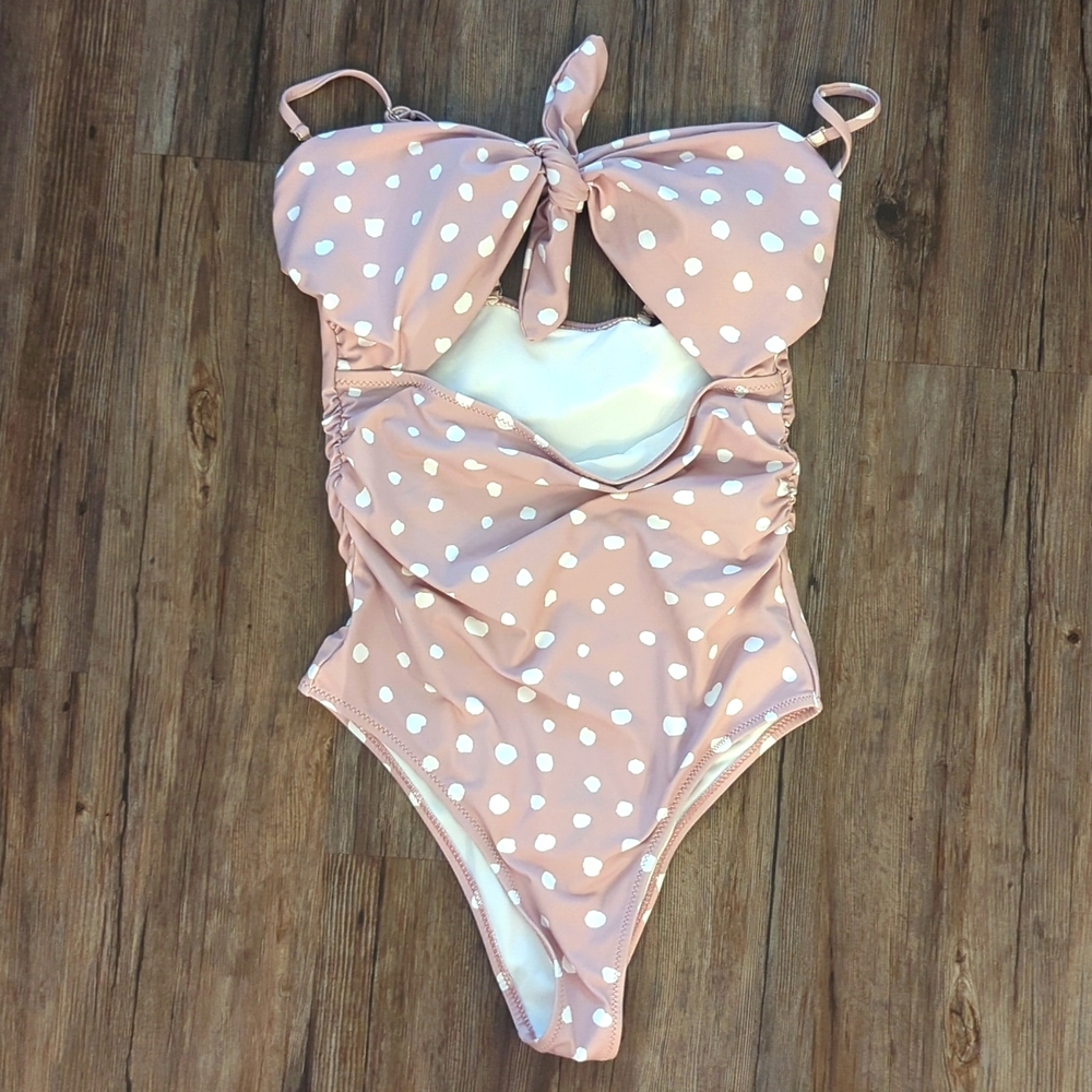 Small pink white polka dot swimsuit